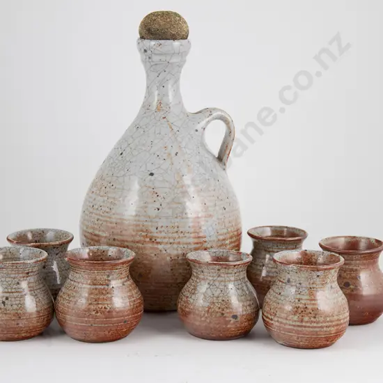 Rust Glazed Wine Flagon and Seven Cups