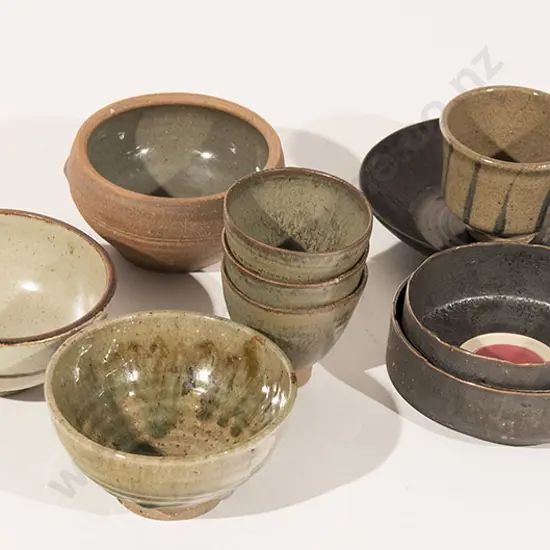 Two Melanie Cooper Circular Bowls with pink glazed roundial to the centre together with four Unomi