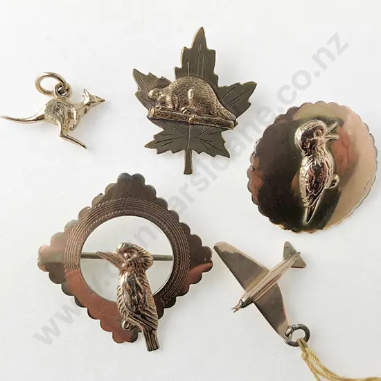 Australian Five Various 9ct and Gold Plated Brooches and Charms