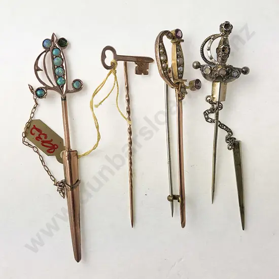 Three Various Sword Brooches and 21 Stickpin