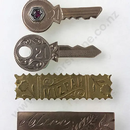 Two 9ct '21' Key Brooches