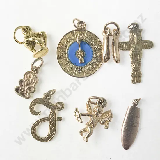 Eight Various Gold Charms