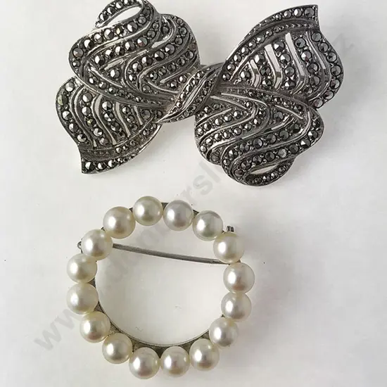 Two S/S Brooches