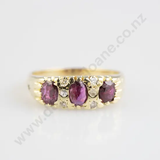 18ct Nine Stone Ruby and DIamond Bridge Ring