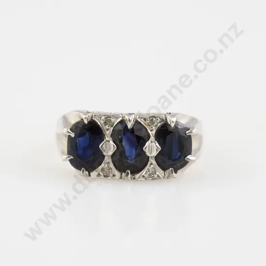 18ct White Gold Three Stone Sapphire Bridge RIng
