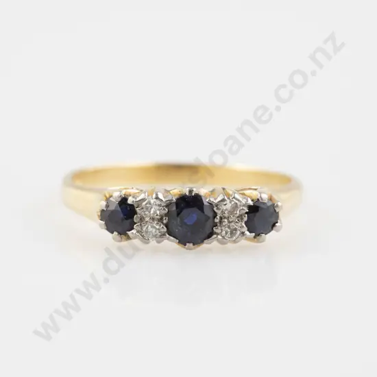 18ct Seven Stone Sapphire & Diamond Bridge Ring