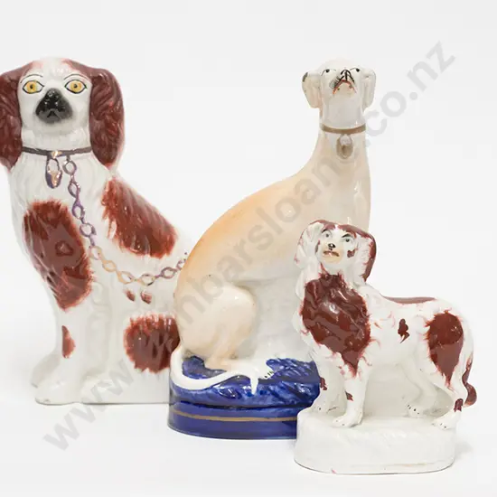 Three Victorian Staffordshire Dog Figures
