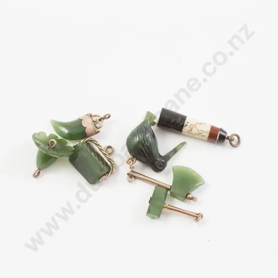 Six Gold Mounted Greenstone Charms