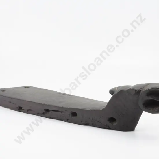 A Pre C19th Carved Maori Wooden Tauihu (Fishing Canoe Prow). Of archaic form with prominent mouth