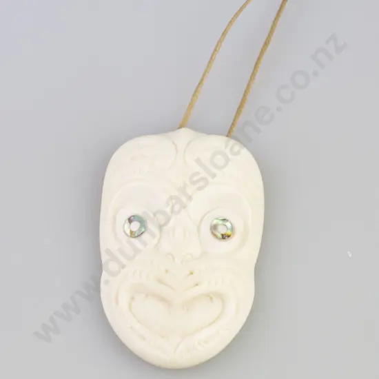 Norman Clark Carved Bone Tiki Mask Pendant