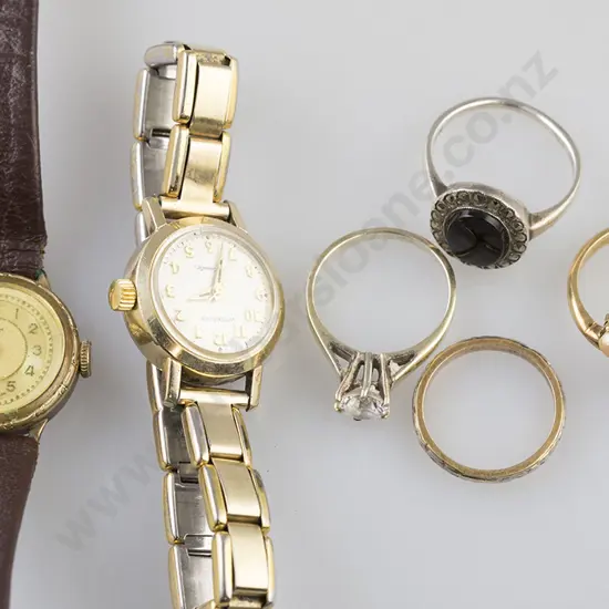 Two 18ct Rings, two silver rings and two wrist watches
