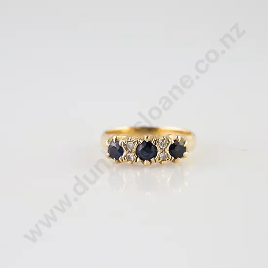 18ct Seven Stone Sapphire & Diamond Bridge Ring