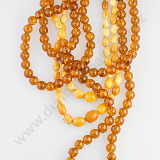 Two Short Opaque Amber Necklaces and Other