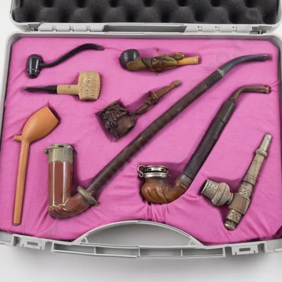 Cased Display Of Ten Wooden Pipes