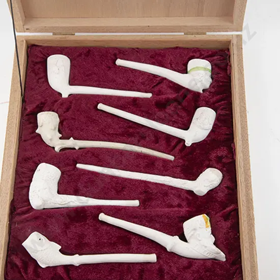 Cased Display Of Eight Clay Pipes