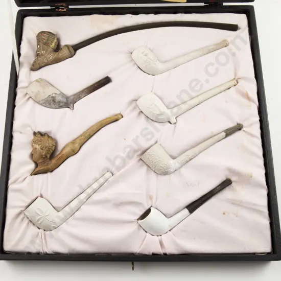Cased Display Of Eight Vintage Clay Pipes