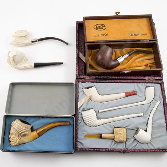 Cased Display Of Five clay Pipes, Wooden Pipe & Three Meerschaum