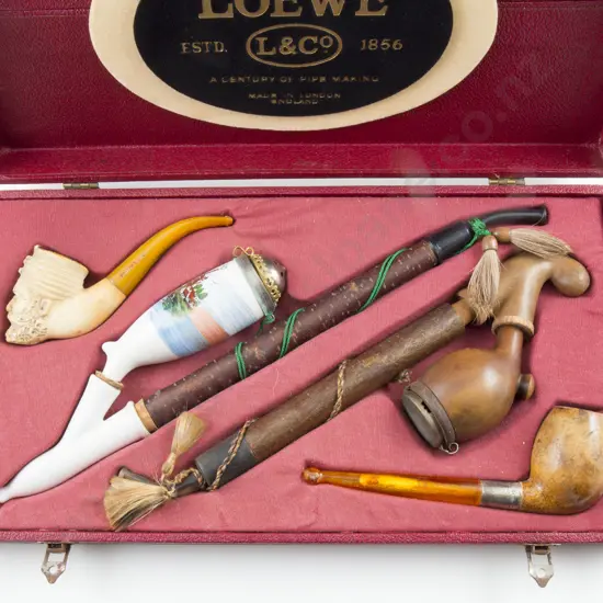 Cased Display Of Four Pipes