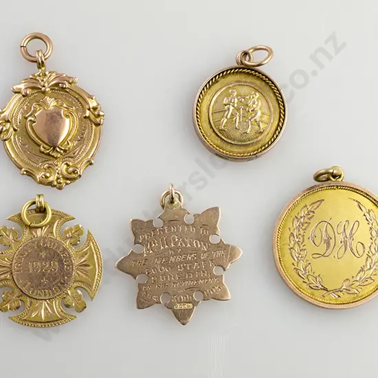 Five Various 9ct Gold Prize Medals