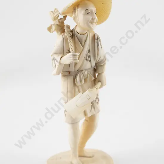 Carved Ivory Figure of a Peasant