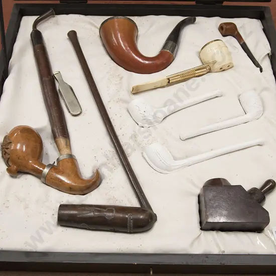 Cased display Of 9 Various Pipes