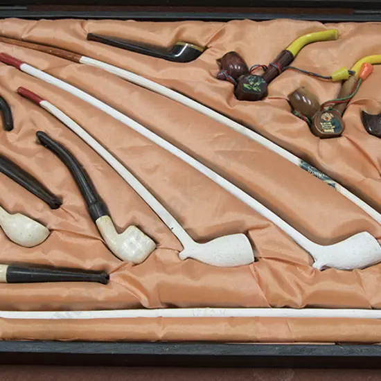 Cased Display Of 15 Various Pipes