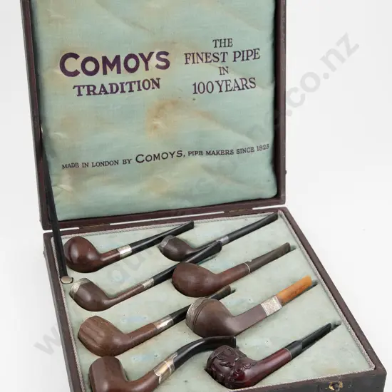 Cased Display Of 8 Wooden Pipes