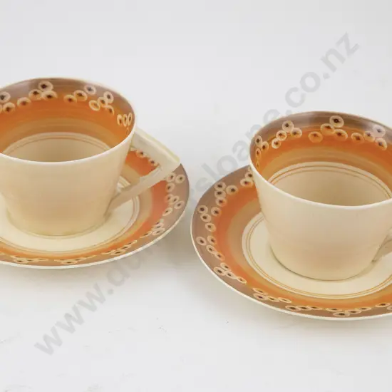 Pair Clarice Cliff Cups & Saucers
