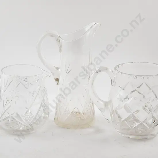 Three Various Cut Crystal Water Jugs