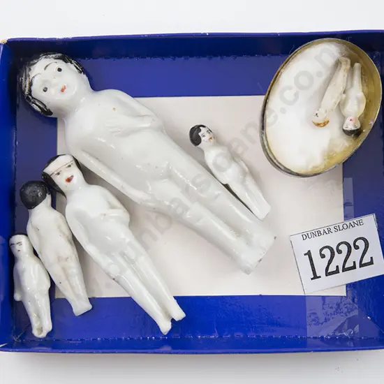 Seven China Frozen Charlotte and Pudding Dolls