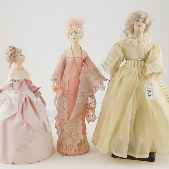 Two Wax Over Composition Half Head Dolls