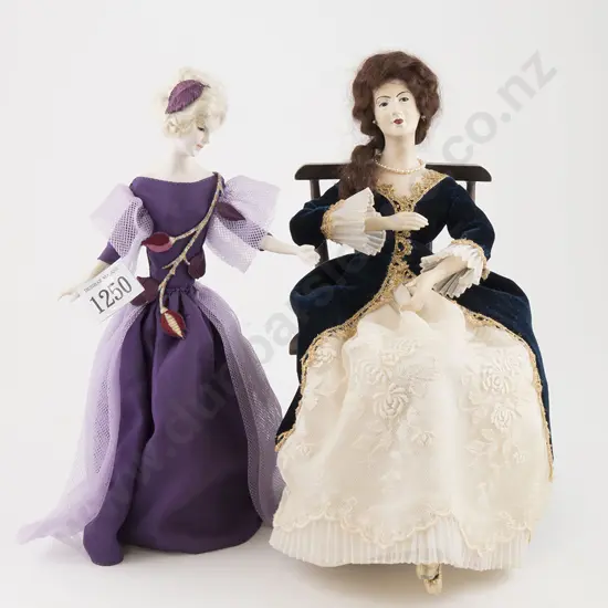 Two Wax Over Composition Half Head Dolls