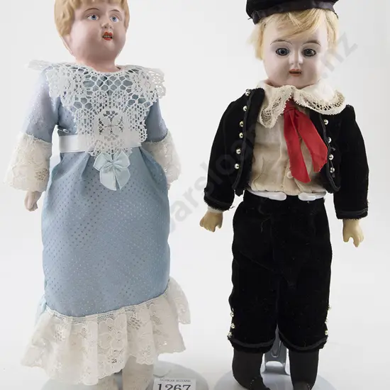 Two Tin Head Shoulder Plate Dolls