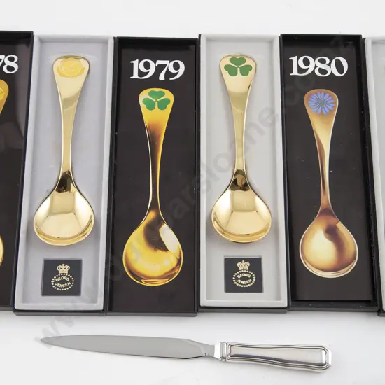 Three boxed George Jensen S/S Gilt Annual Floral Spoons
