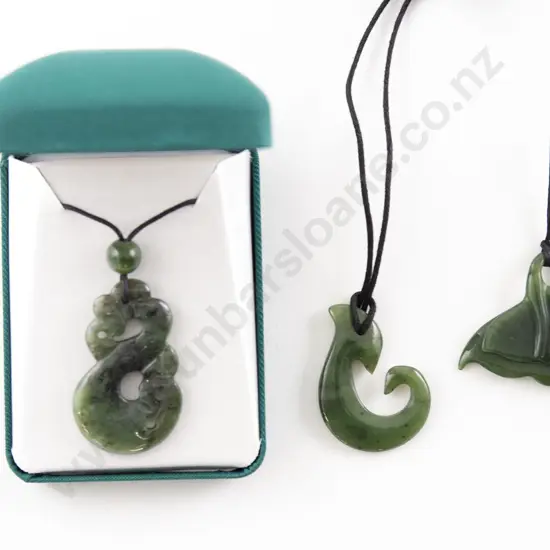 Three Greenstone Pendants