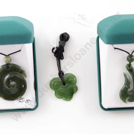 Three Greenstone Pendants