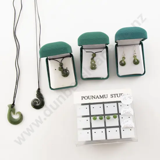 Four Greenstone Pendants