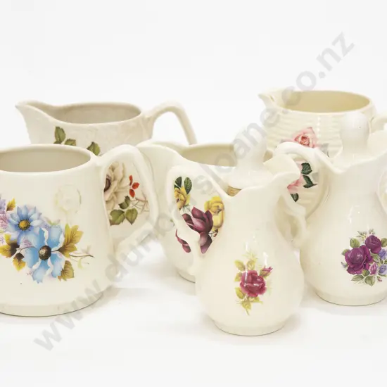 Six Assorted Floral Decorated Jugs