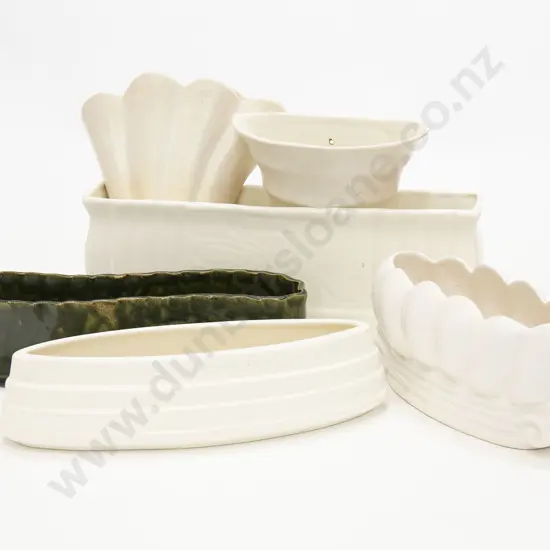 Three Wall Pockets and Four Trough Vases