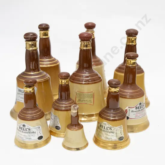 Quantity of Royal Doulton and Wade Bells Whisky Decanters