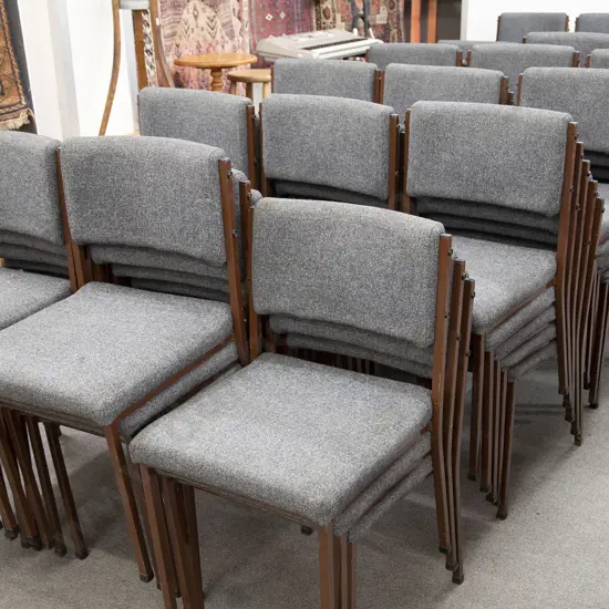 Eighty Upholstered Stacking Chairs
