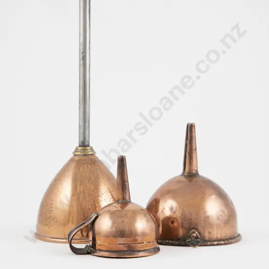 Three Graduated Copper Funnels