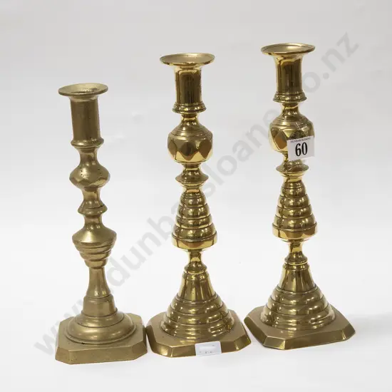 Pair of Brass Candlesticks and Other Brass Candlestick