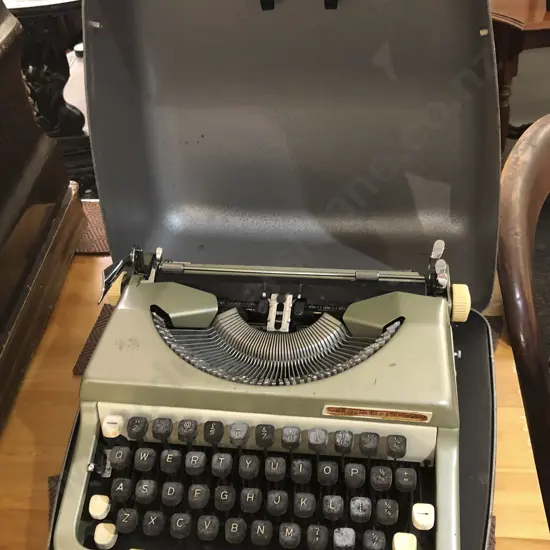 Vintage Roberston Cased Sewing Machine and Vintage Typewriter