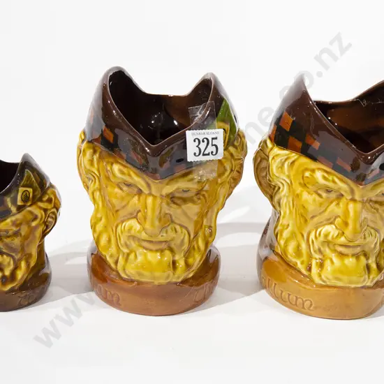 Three Wade McCallum Whisky Jugs of sizes