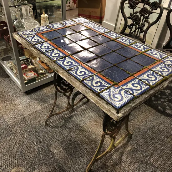 Tile Top Outdoor Table with Wrought Metal Sewing Machine Base