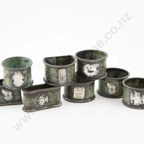Eight Peruvian Bronze & Silver Overlaid Napkin Rings