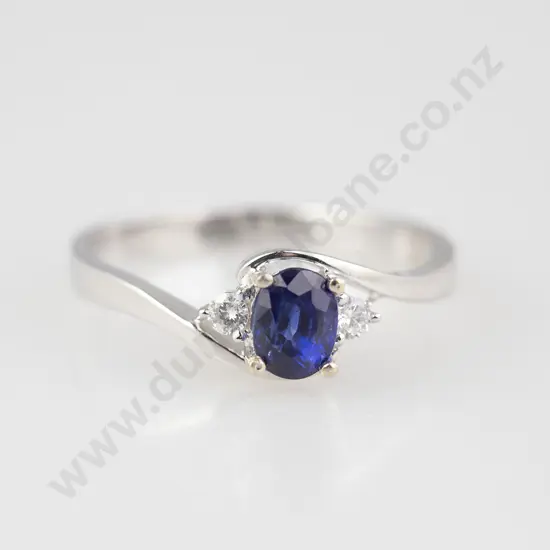 18ct White Gold Three Stone Sapphire and Diamond Bridge Ring
