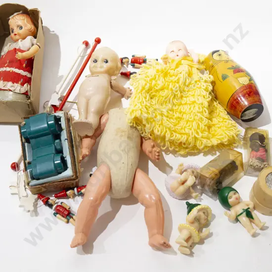 Toys Including Russian Stacking Doll and Celluloid Kewpie Doll