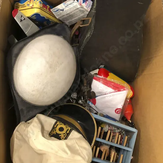 Box of Toys and Hats With Ukulele